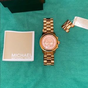 MK rose gold big face watch